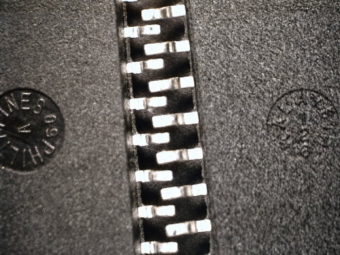 Two counterfeit A5841SLW parts with the same lot code, one indent marked PHILIPPINES and the other MALAYSIA
