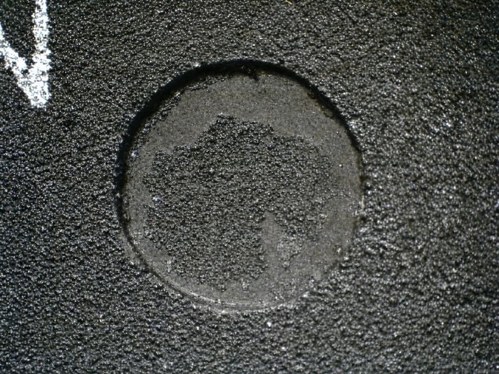 Counterfeit HD61602R showing two different surface textures within one area