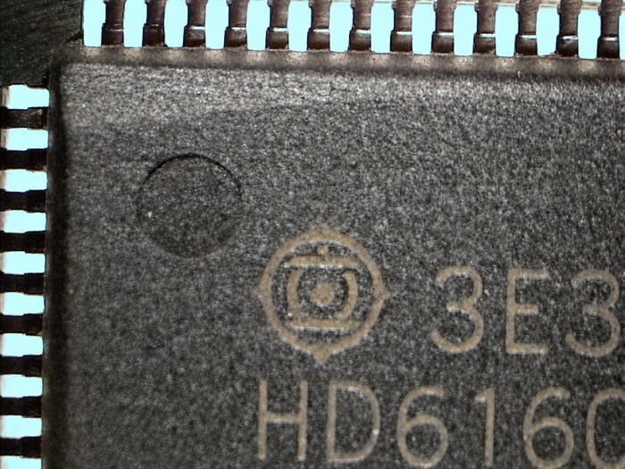 Counterfeit HD61602R 3E3 with an over-sanded sloping edge from remarking