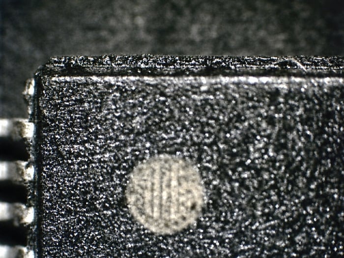 Suspected counterfeit TC58FVT160AFT-70 before solvent test at the pin one indent